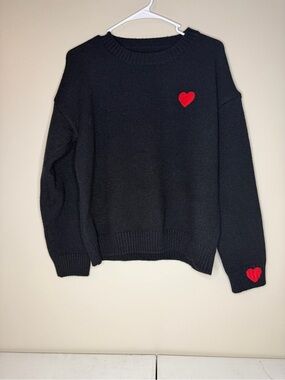 Black Crewneck Sweater with Red Heart Accents - Women's